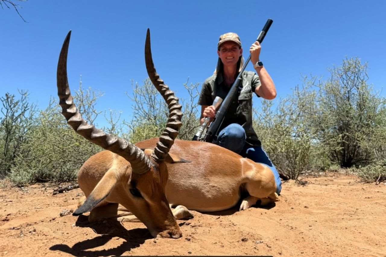 A huntress with her plains game trophy