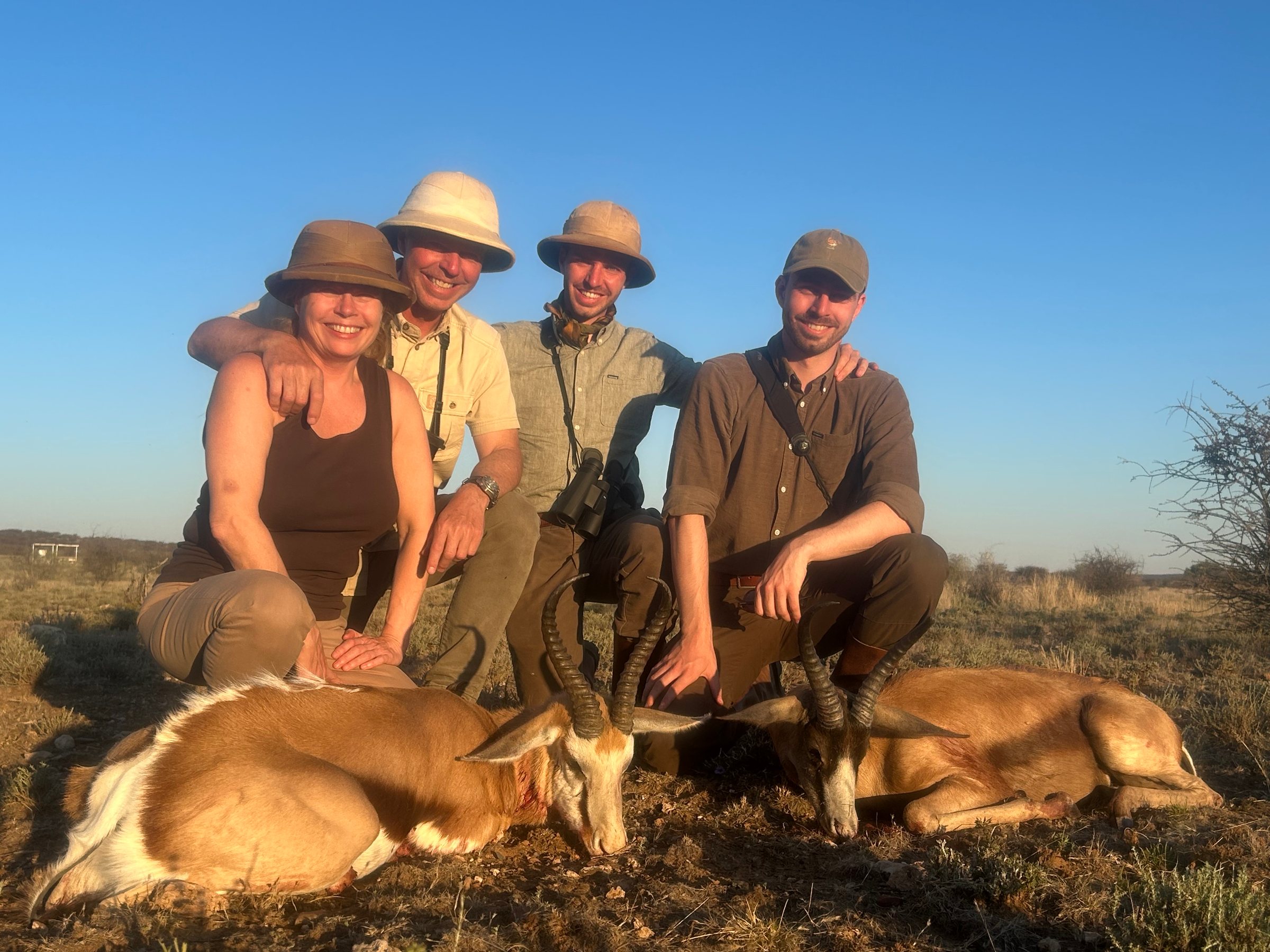 Four guests with two springbok