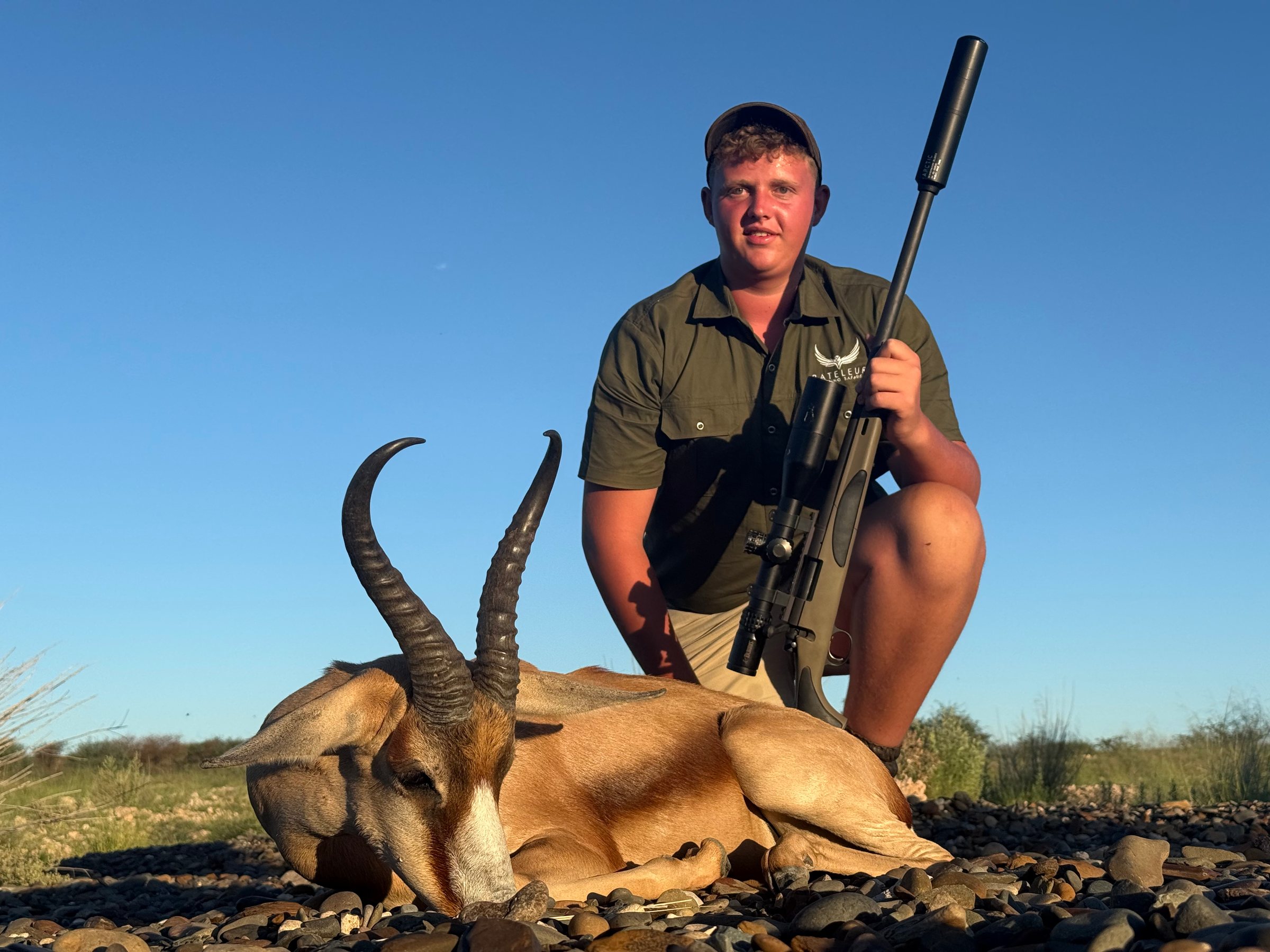 A young hunter with his springbok