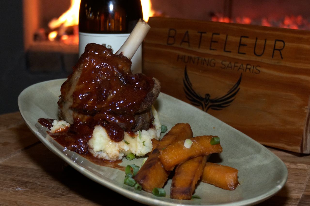 A slow-cooked shank served by the fire