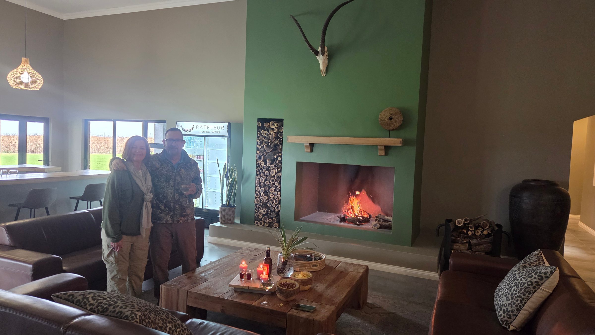 Guests by the lounge fireplace