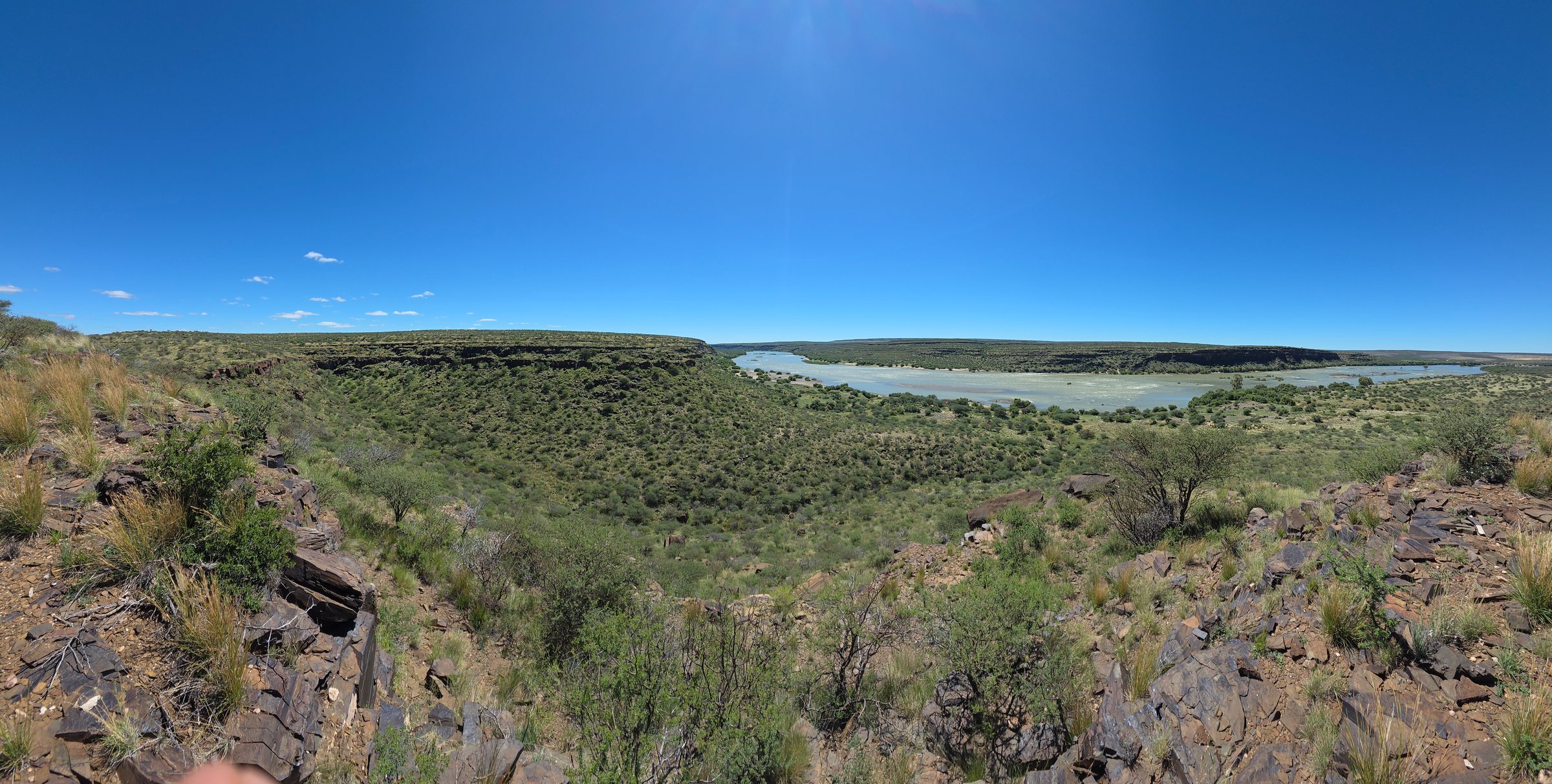 A wide view over the bush to the river in the Northern Cape