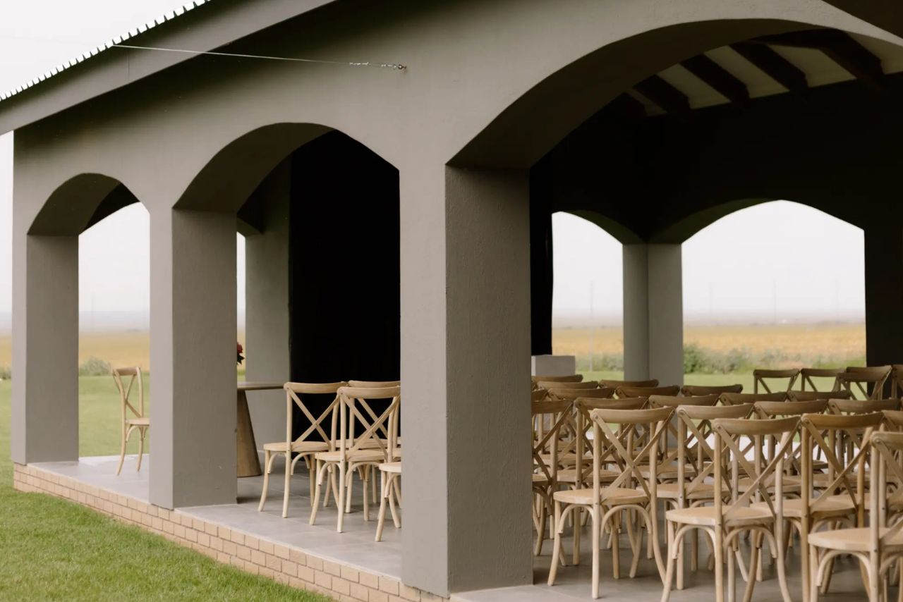 The arched pavilion set for a ceremony